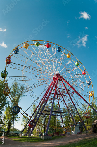 Merry go round wheel in park amusement