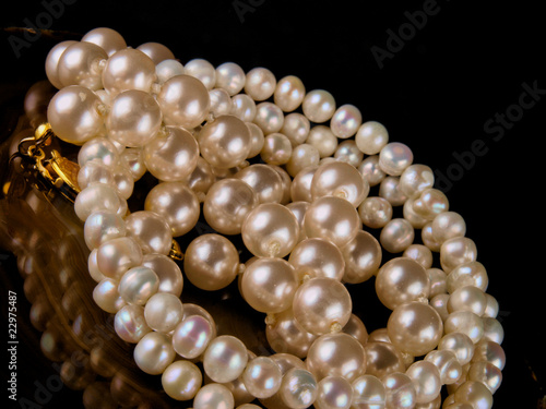 pearl bracelet close up on black background
