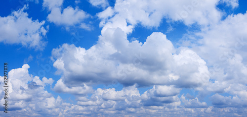 White clouds in the blue sky. Cloudscape