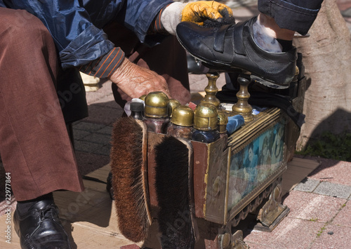 Shoe shiner at work