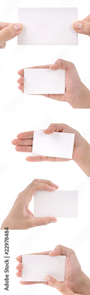 Woman hand holding five blank business cards isolated Woman hand holding five blank business cards isolated