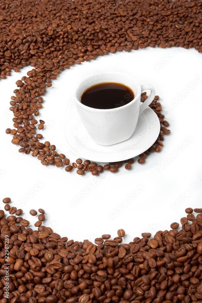 Fototapeta premium Cup with coffee, costing on coffee grain