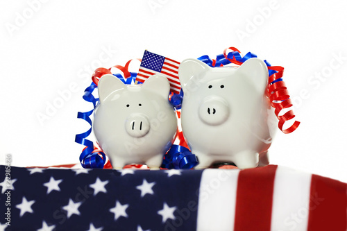 Two Patriotic Piggy Banks on American flag