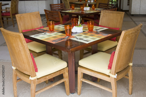 Table and chairs in empty cafe