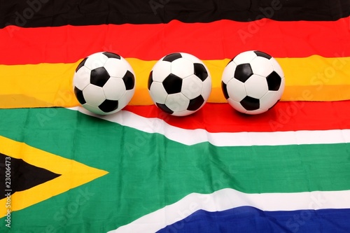 soccer balls on south africa and german flag