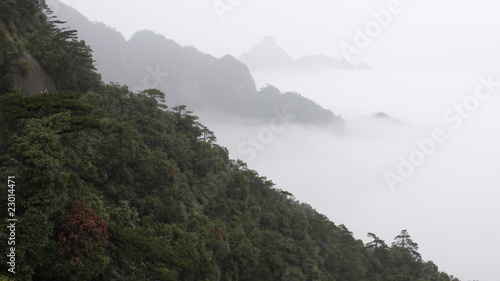 san 4 Time lapse of clouds crossing over mountain in the rain. photo