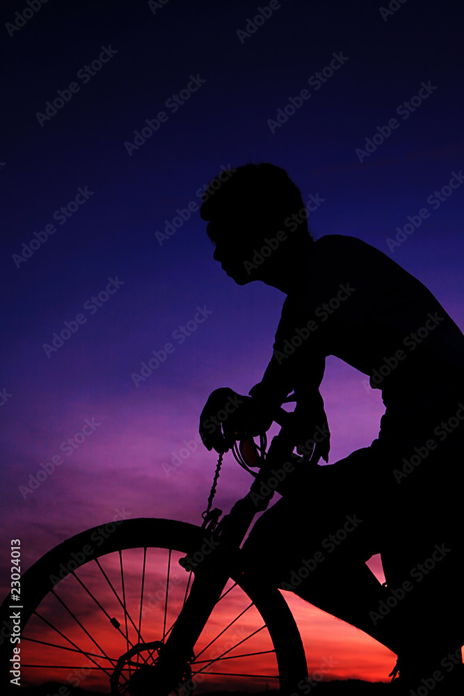 Obraz premium young asian man with bike