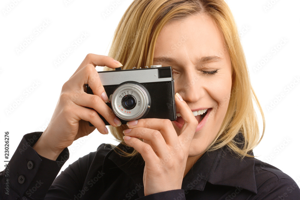young woman taking a shot with photo camera young woman taking a shot with photo camera