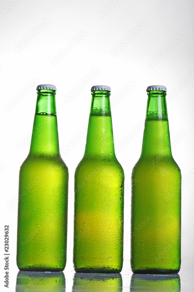 Beer in bottle on a white background . Beer in bottle on a white background .