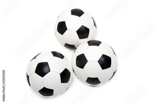 three classic soccer balls  isolated 
