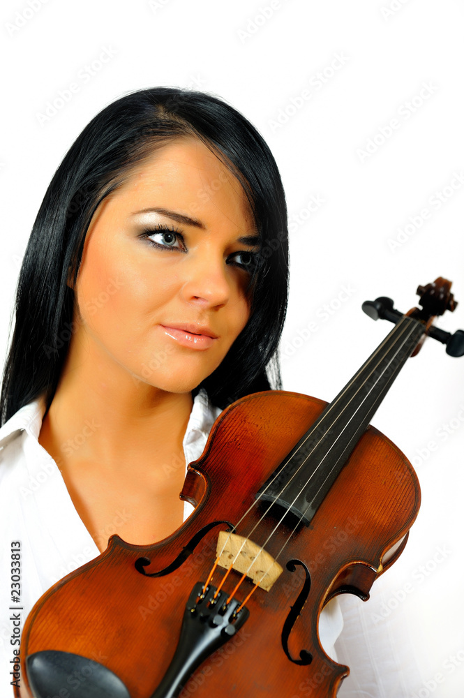 Young beautiful woman with violin. isolated on white background Young beautiful woman with violin. isolated on white background