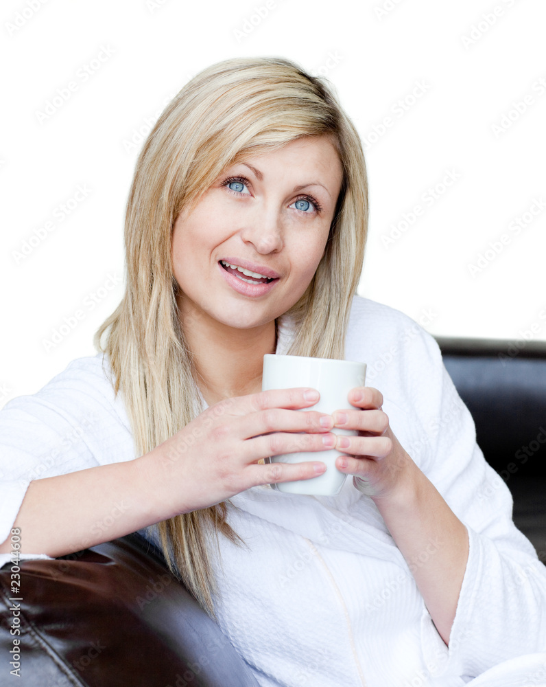 Smiling woman holding a cup of coffee Smiling woman holding a cup of coffee