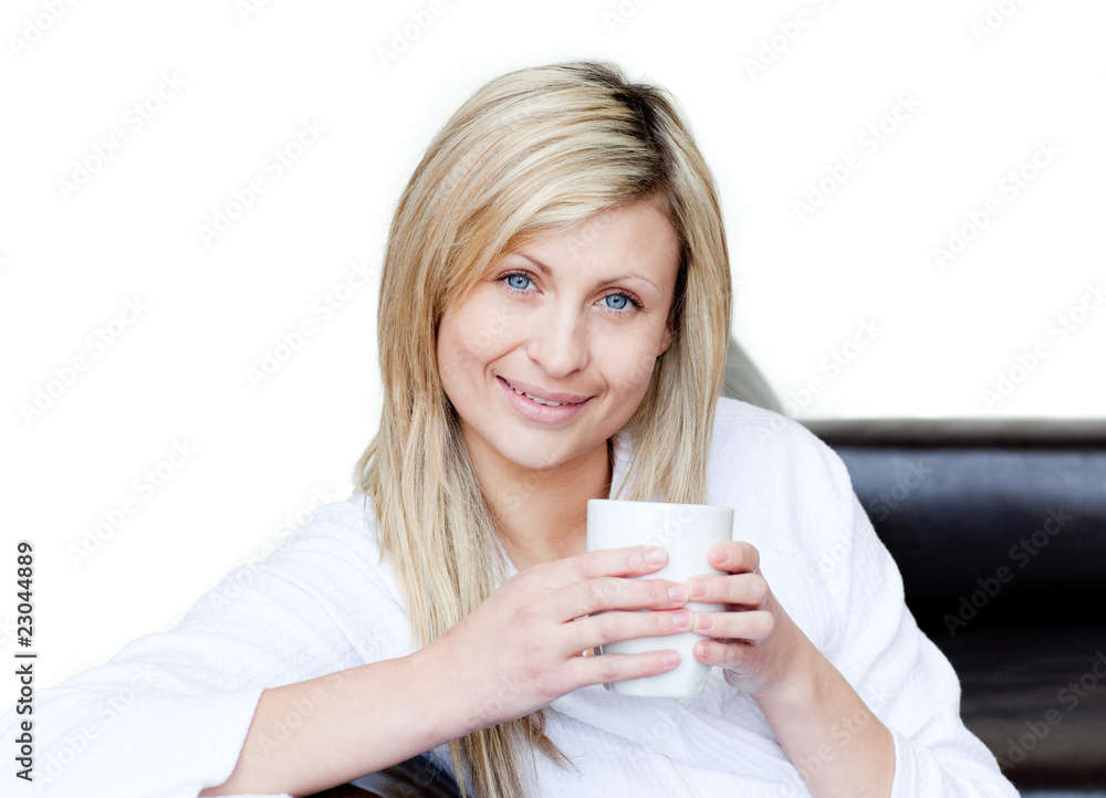 Self-assured woman holding a cup of coffee Self-assured woman holding a cup of coffee