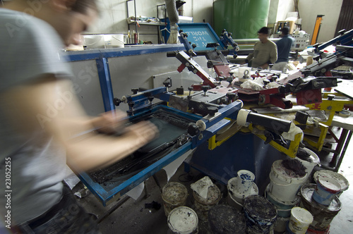 man at work in serigraphy photo