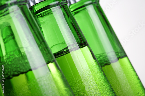 Beer in bottle on a white background .