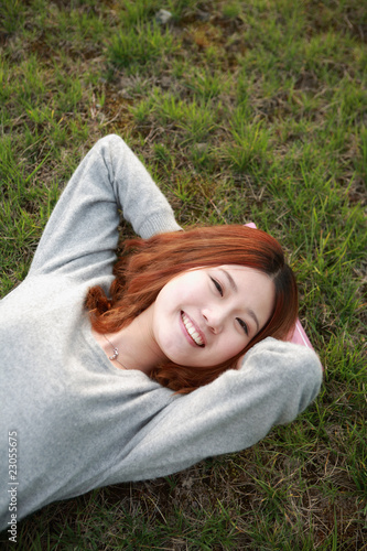 asina reading book on grass