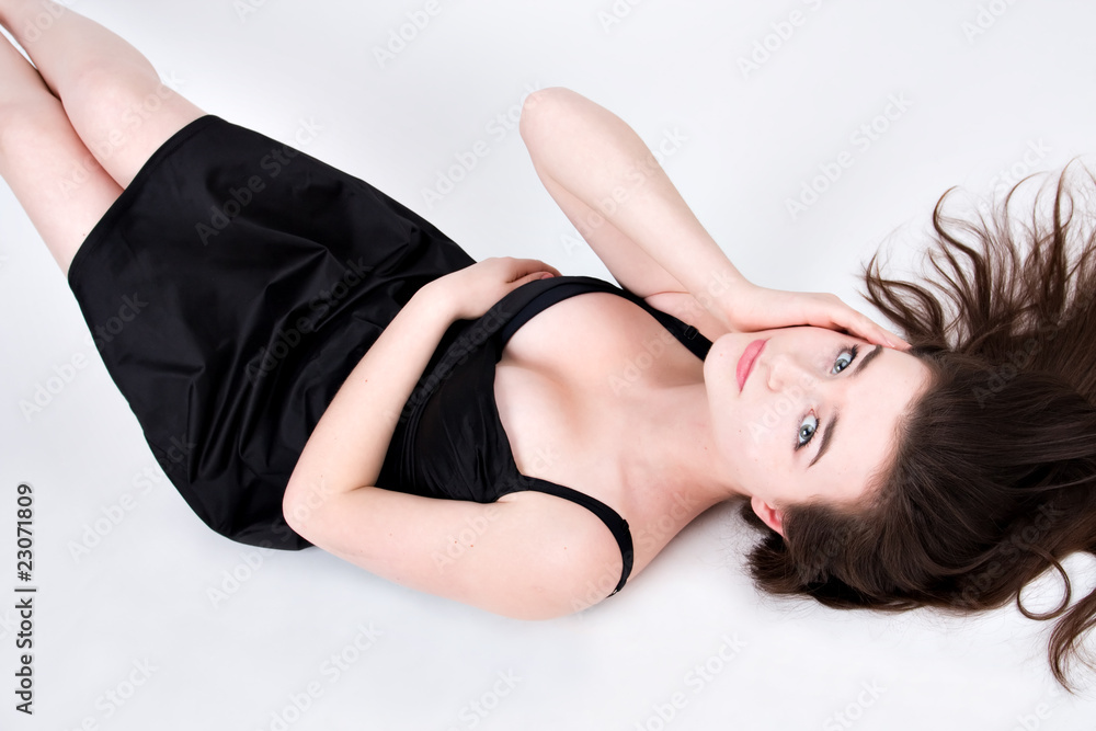 Portrait of the beautiful pretty woman with long curly hair Portrait of the beautiful pretty woman with long curly hair