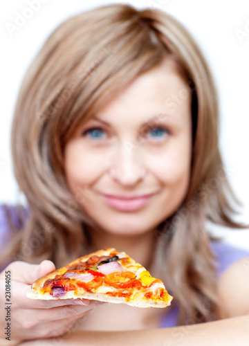 Attractive woman holding a pizza