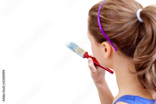 Caucasian woman using a paintbrush