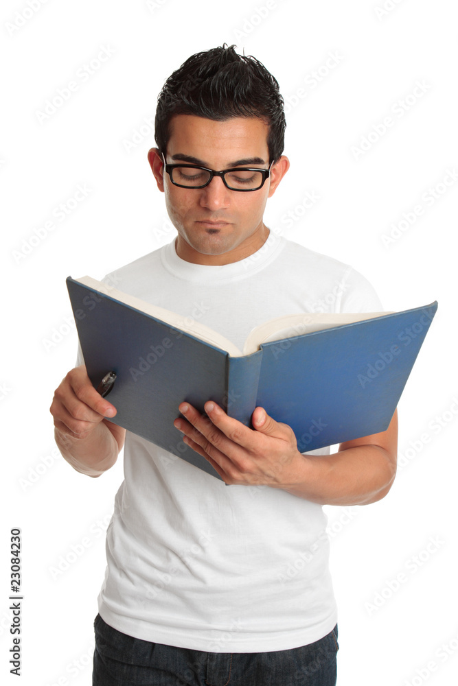 Man in spectacles reading a book Man in spectacles reading a book