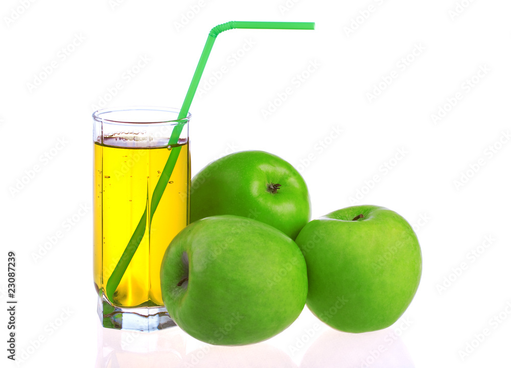 Glass of apple juice with green apples Glass of apple juice with green apples