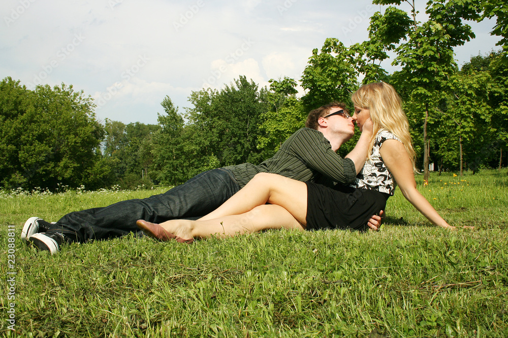 young man and girl kissing outdoor