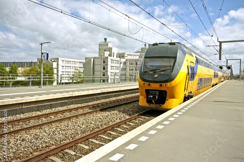 Train arriving at Bijlmerstation in Amsterdam the Netherlands photo