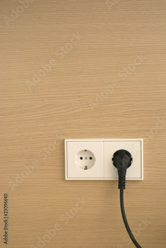Wall outlet with power cord