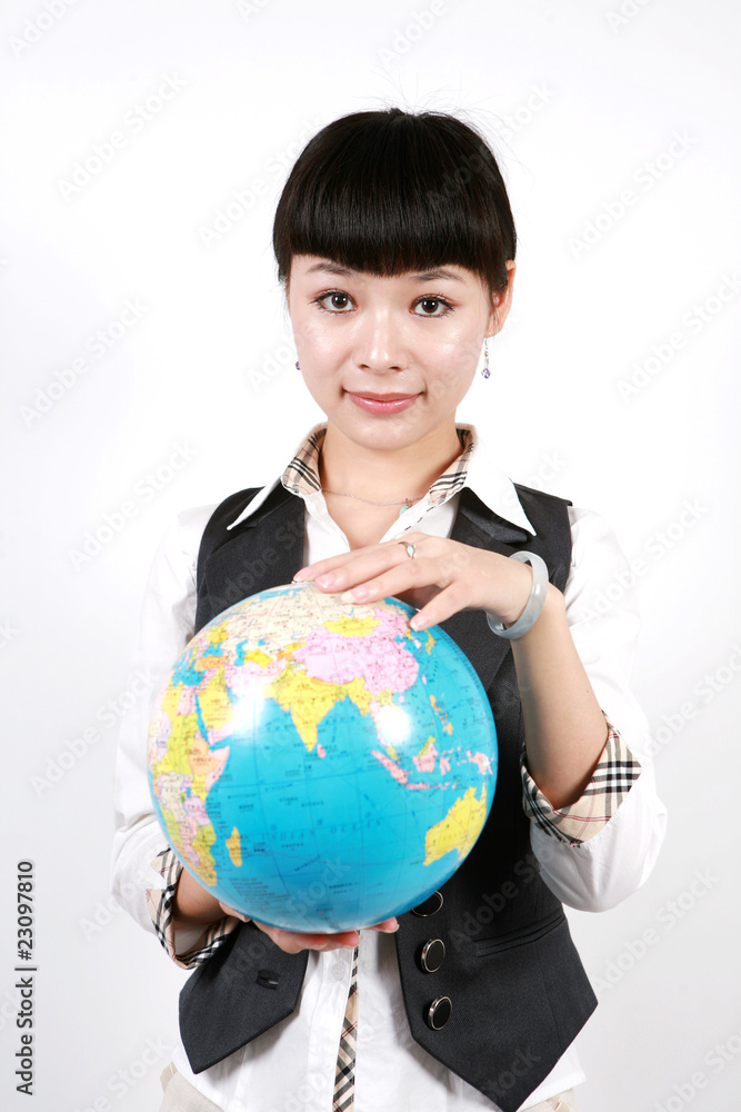 businesswoman holding a globe on white background businesswoman holding a globe on white background