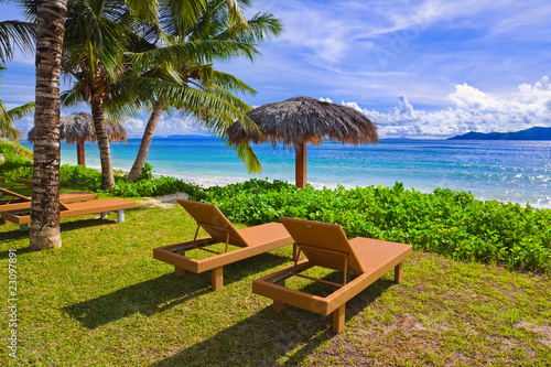 Chairs on tropical beach