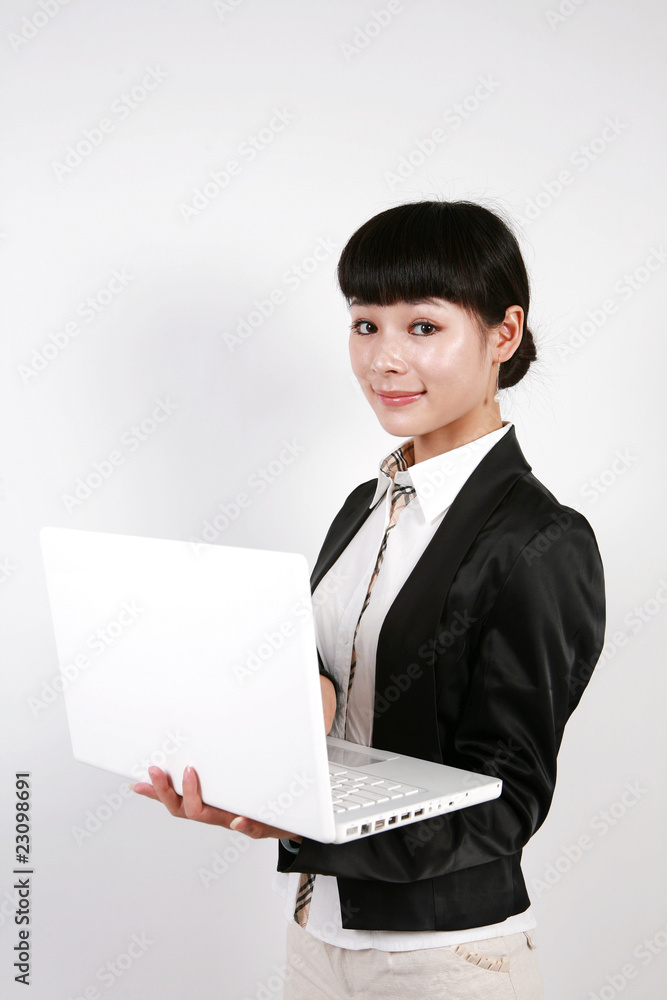 Businesswoman and portable computers on white Businesswoman and portable computers on white