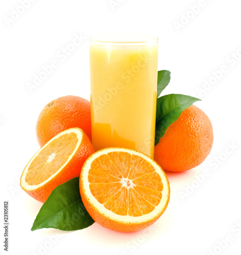 Ripe oranges and juice.