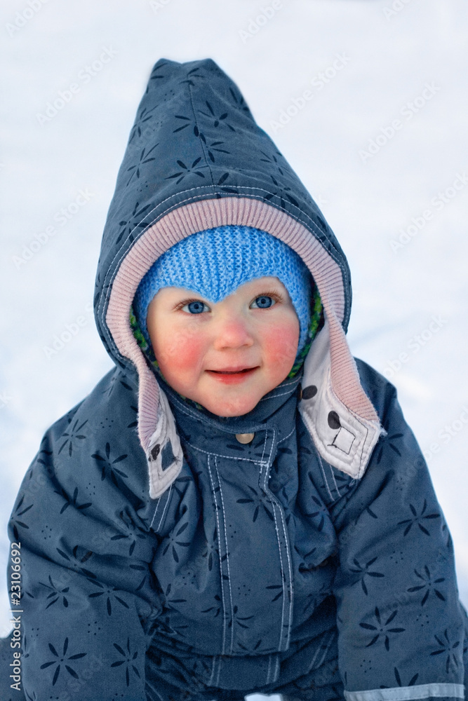 Innocent small girl in winter clothes Innocent small girl in winter clothes