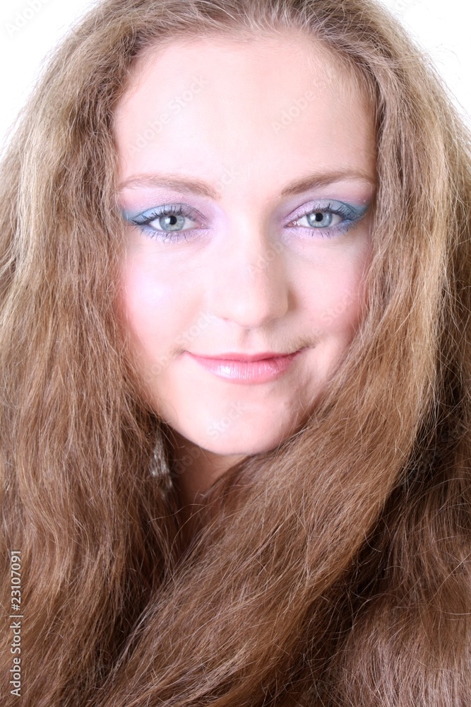 Portrait of a blue-eyed girl with long hair Portrait of a blue-eyed girl with long hair
