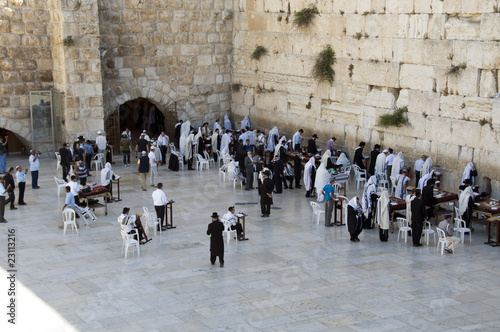 jew people praying at the wetern wailing wall in jerusalem Israel photo