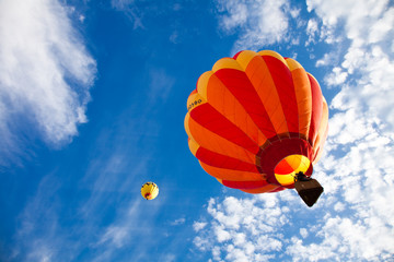 Acrylglasbilder Ballon Heißluftballons im Flug am Himmel  © Jeff Schultes