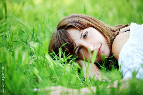 Girl resting in grass