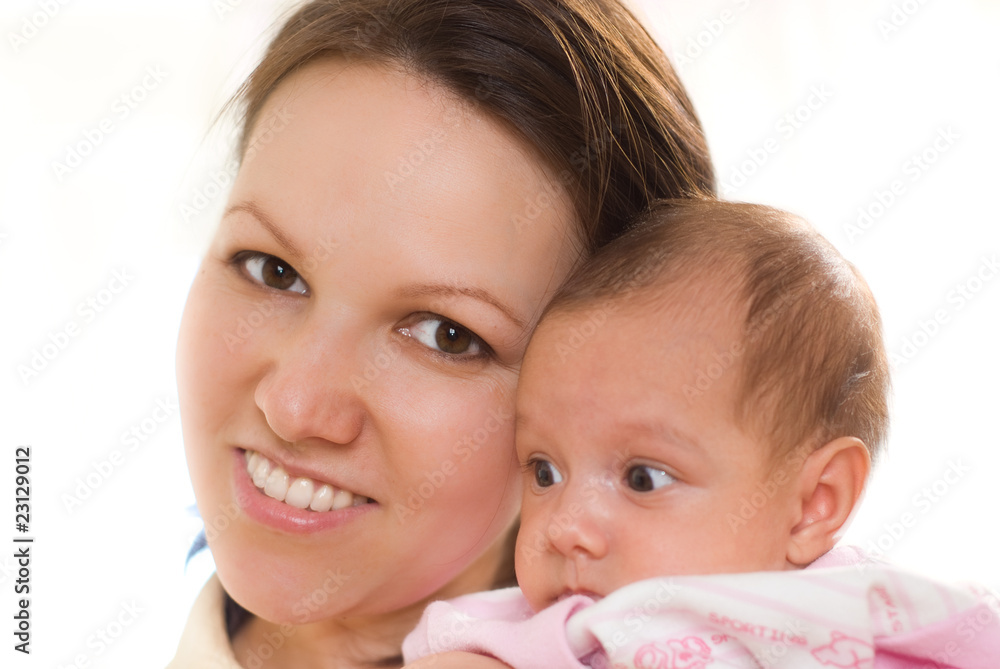 woman holding a newborn woman holding a newborn