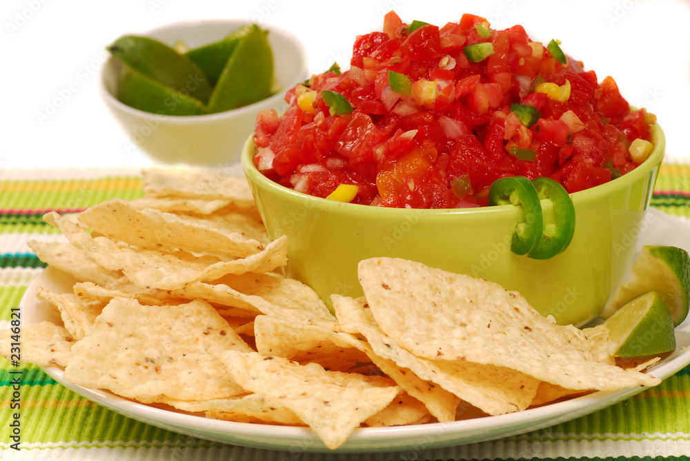 Tortilla chips with salsa and lime Tortilla chips with salsa and lime