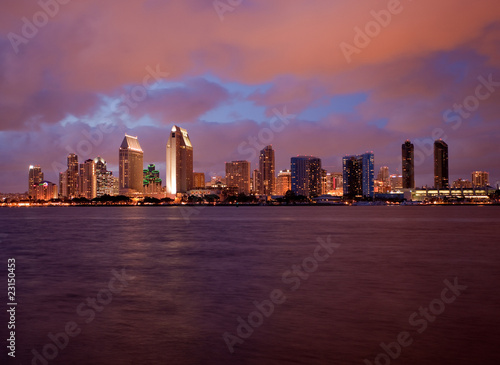 Orange clouds reflect light from San Diego Skyline © steheap