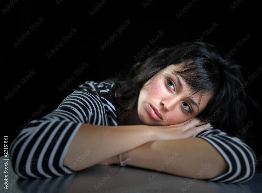 Beautiful brunette fashion model on black background. Beautiful brunette fashion model on black background.