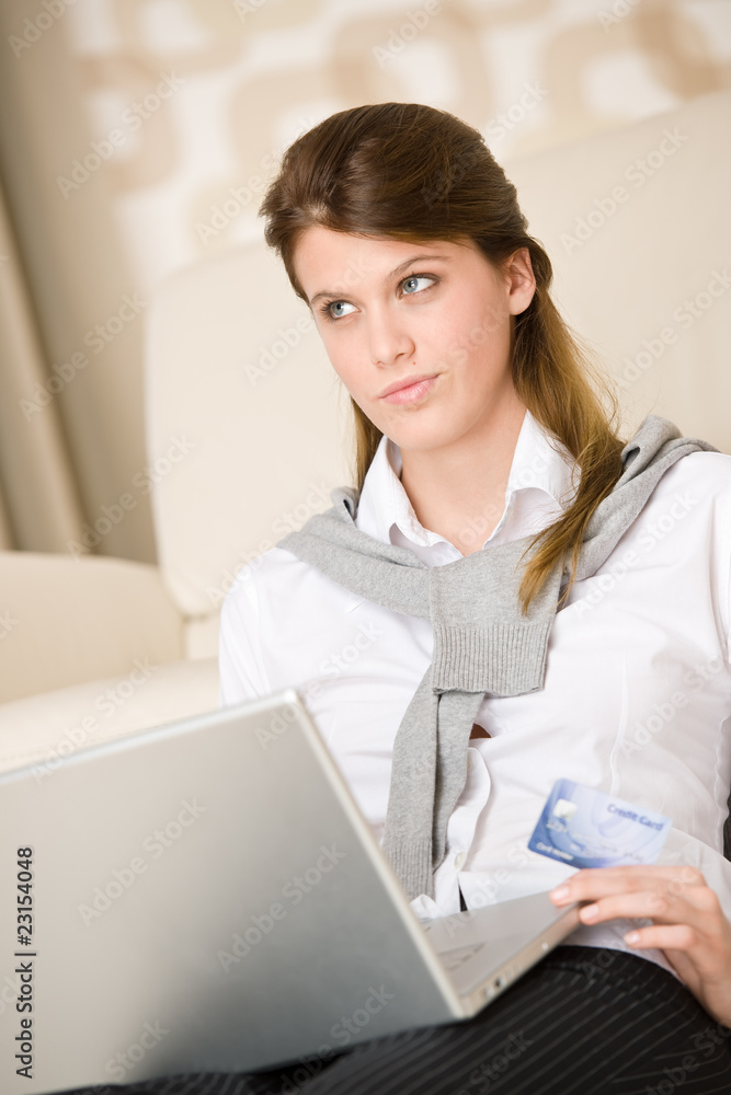 Home shopping - woman with credit card and laptop Home shopping - woman with credit card and laptop