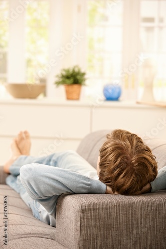 Man relaxing on couch