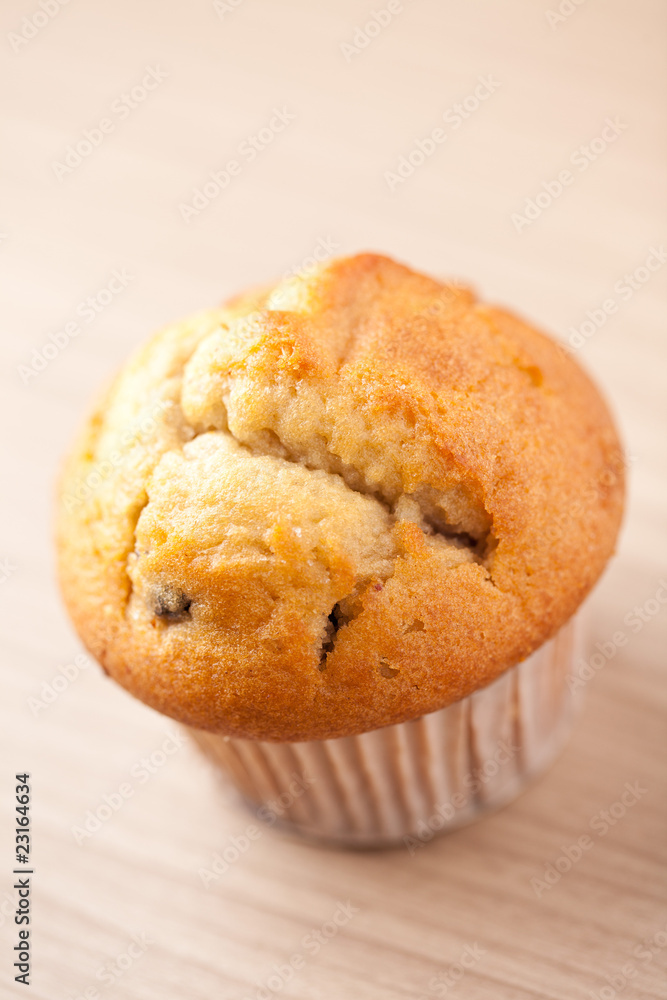 muffin on wooden table muffin on wooden table
