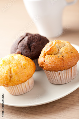 muffins on wooden table
