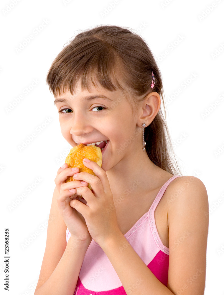 The girl eats a patty