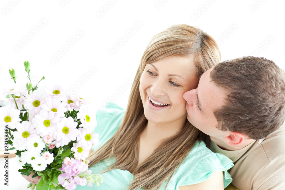 Enamored man giving a bouquet to his girlfriend Enamored man giving a bouquet to his girlfriend