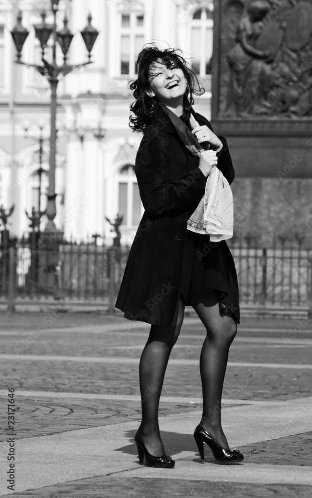Laughing woman on the old city street Laughing woman on the old city street