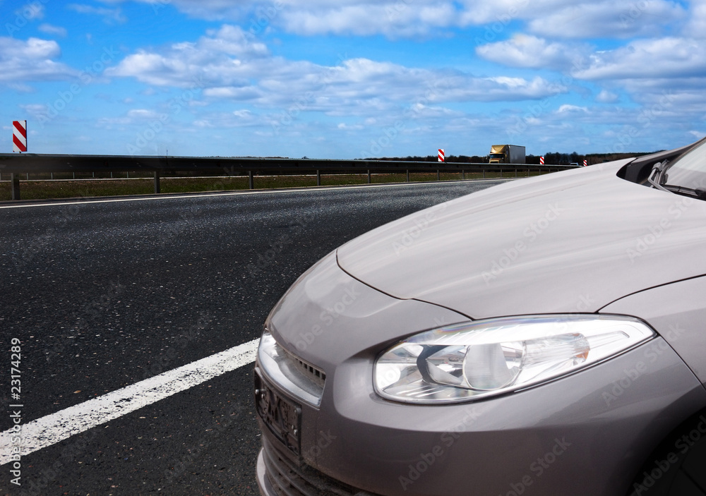Fototapeta premium New car alongside the road