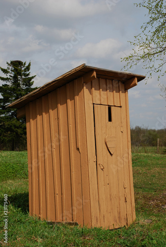 Brown wooden WC
